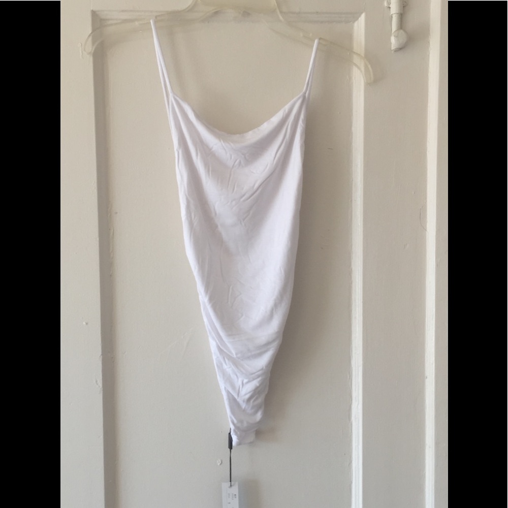 INDAH BODY WHITE BODY SUIT. NEW WITH TAGS